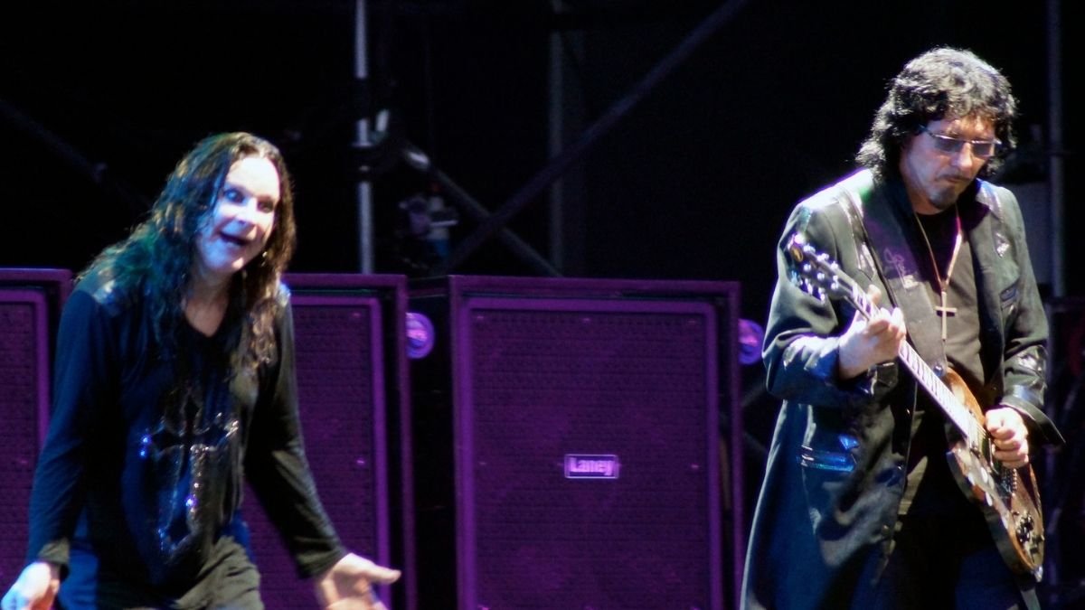 Ozzy Osborne and Tommy Iommi in a Black Sabbath concert.
